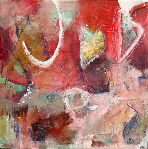 warm reds and creamy whites surround a golden heart. A warm edition to a room that is filled with love.
